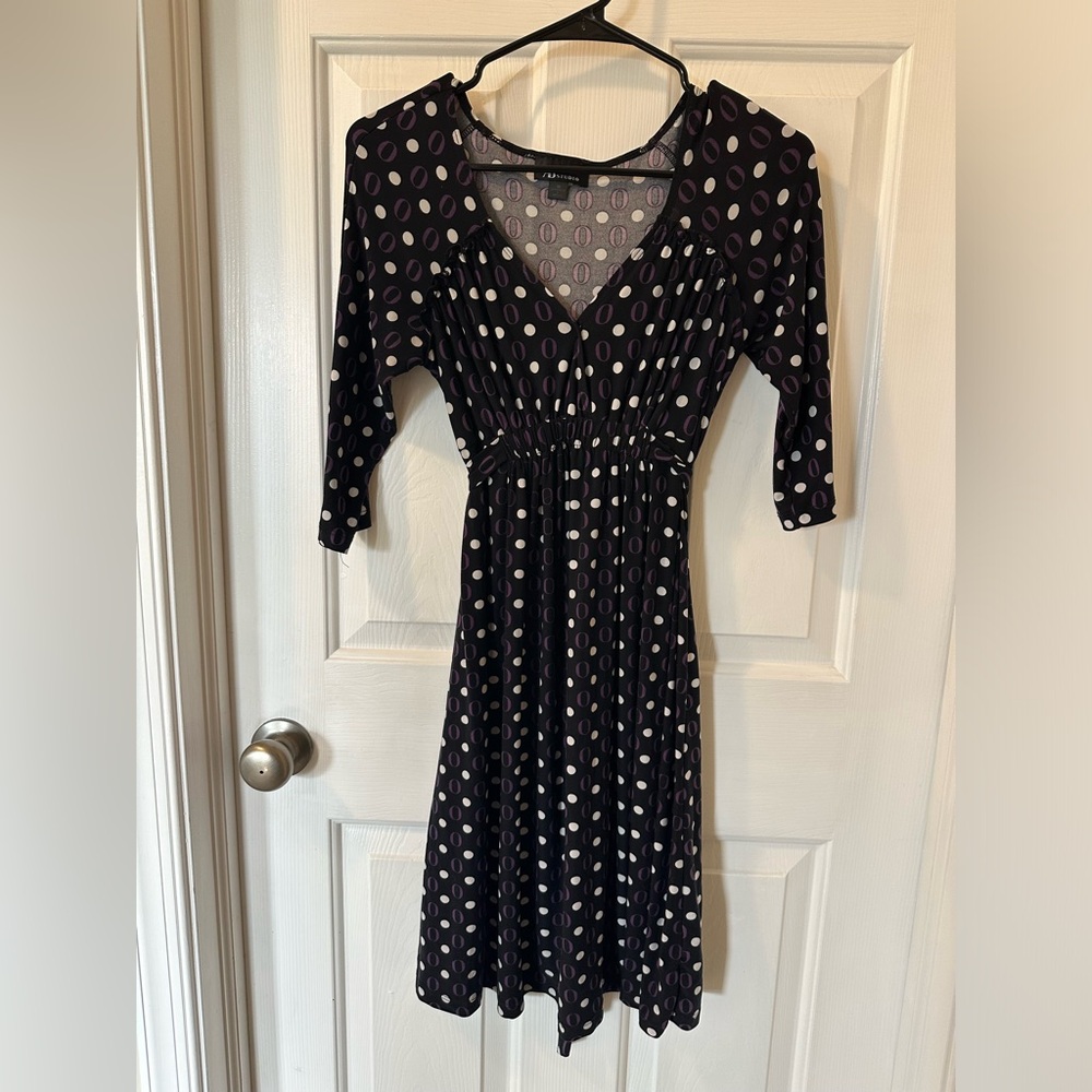 Women’s AB Studio dress. Black with a purple and white print. Size M.